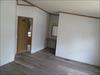 Master Bedroom.  Vanity table, walk in closet and entrance to master bath