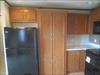Kitchen.  The cabinets open and lead to the laundry room. 