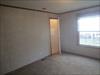 Master Bedroom.  Door is to the hallway to the kitchen.