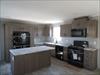 Notice the cabinets in the kitchen.  Lots of cabinets