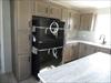 Notice the pantry around the refrigrator